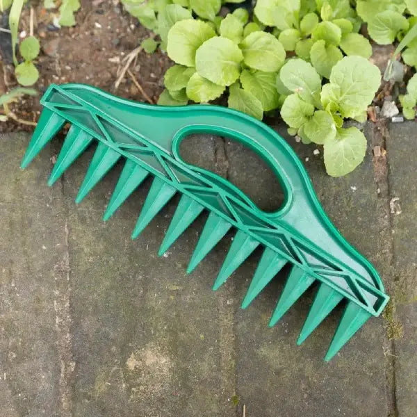rastelo plantador sementes, plantador 12 dentes horta, ferramenta plantio fileiras, plantador sementes jardim, rastelo ergonômico horta, plantio uniforme canteiro, ferramenta horta urbana, plantador PP resistente, sementes espaçamento uniforme, ferramenta plantio vaso